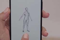 Photo in detail of a smartphone screen with a 3D woman figure